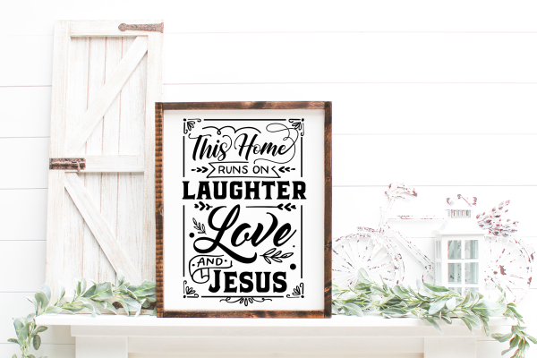 Free This Home Runs on Laughter Love and Jesus SVG Quote